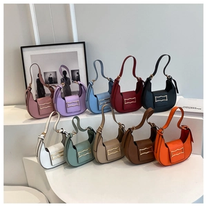 Detailed display of ten colorful hobo bags with golden buckles on a white background