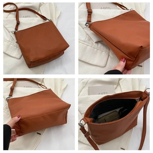 Detailed views of brown pebble leather shoulder bag with spacious interior and zipper