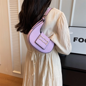 Minimalist light purple crescent shoulder bag with golden metallic buckle detail