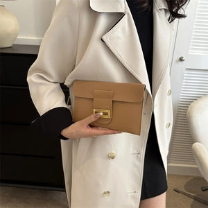 Classic camel envelope clutch bag with gold metallic buckle for elegant women