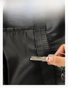 Close-up of the scratch-resistant nylon fabric surface on the black gym bag