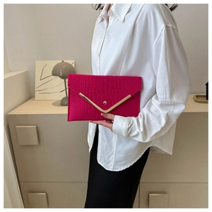 Fashionable rose pink envelope clutch bag with crocodile texture and gold V-accent