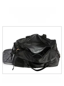 Detailed interior of 15L black fitness bag with reinforced handles and wide opening