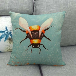 Linen pillowcase with hand-painted bumblebee illustration on retro teal background