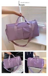 Purple fitness bag with luggage strap, adjustable shoulder strap and water-repellent nylon