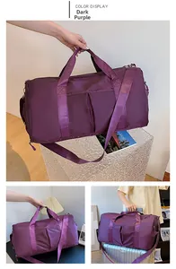 Detail of dark purple travel duffel bag with reinforced handles and luggage sleeve feature