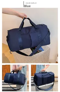 Blue travel bag detail showing wet-dry separation and suitcase trolley sleeve handle