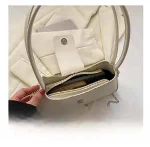 Internal view showing spacious capacity of the cream minimalist women shoulder bag