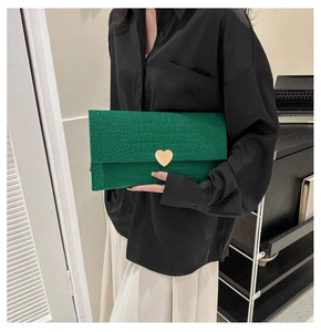 Green crocodile pattern envelope clutch featuring a vintage gold heart metal clasp buckle