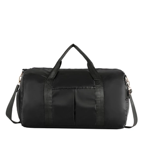 Sac de voyage en nylon noir avec matériel or rose et bandoulière réglable pratique