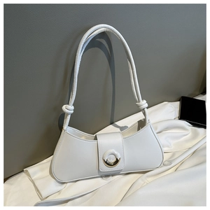 Detail of white leather crescent shoulder bag with knot strap and metallic buckle