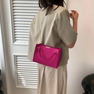Rose red quilted felt crossbody bag with gold chain strap for winter fashion