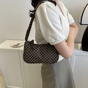 Vintage brown shoulder bag with geometric patterns for stylish commuting