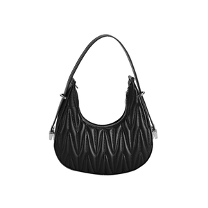 Minimalist black quilted crescent hobo bag with matelasse texture and silver zipper