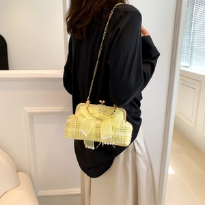 Yellow tweed shell bag with pearl pendant and organza bow on metal chain strap