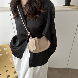 Chic beige crescent moon crossbody bag with matching small pouch for women fashion