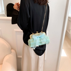 Light green tweed shell bag with pearl bow and gold chain strap for women