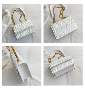 Detailsicht der weißen gesteppten Umhängetasche mit goldener Kette für Damen