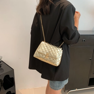 Elegant gold quilted crossbody chain bag with rectangular turn-lock and metallic finish