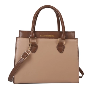 Elegant two-tone brown tote bag with top handle and adjustable shoulder strap for women
