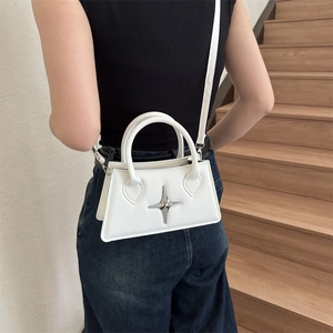 Chic white crossbody bag for women with silver star detail and adjustable strap