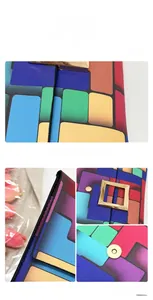 Dettagli della pochette geometrica colorata con chiusura dorata e trama in pelle