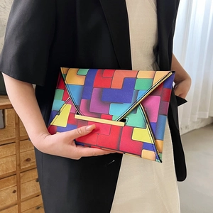 Colorful geometric patchwork envelope clutch in premium textured leather for women