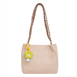 Retro beige woven shoulder handbag with brown straps and yellow flower charm decoration