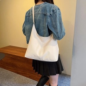 Minimalist beige hobo tote bag with vertical stitching for women's daily commute