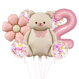 Detail of 2nd birthday party balloon set with bear flower and pink confetti balloons