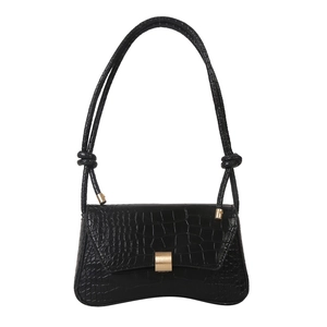 Elegant black crocodile pattern underarm baguette bag with golden buckle and knot detail