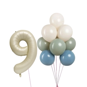Detail of cream, bean green, and blue balloons with champagne gold number 9 foil balloon