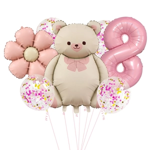 Detail of teddy bear balloon set with number 8 and pink glitter balloons for party