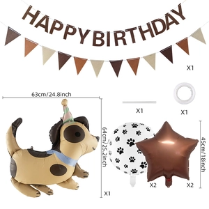 Detail of dog birthday party set with puppy foil balloon and paw print decorations
