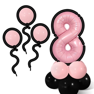 Detail of pink number 8 foil balloon with cartoon black borders and latex base decoration