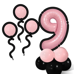 Detailed assembly of pink number 9 foil balloon stand with black cartoon style accents
