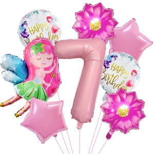 Détail du kit de ballons 7 ans avec fée rose et décorations en forme de fleurs