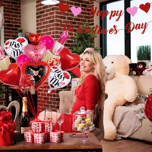 Valentine's Day party decor set with red lipstick balloons and Happy Valentine's Day banner