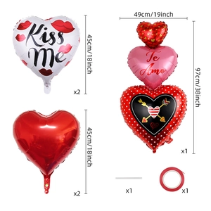 Flat lay of Valentine's heart balloons set including Te Amo and Kiss Me printed designs