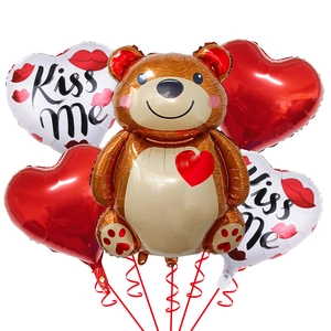 Detail of Valentine bear balloon with heart balloons and Kiss me lip print pattern