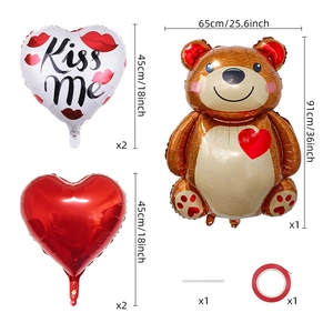 Detailed set including bear balloon, kiss me hearts and red ribbons for decoration