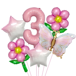 Detail view of butterfly and daisy foil balloon set for girl's 3rd birthday party decor