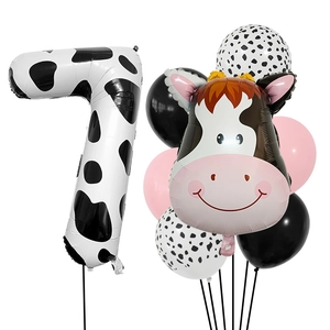 Détail du set de ballons d'anniversaire vache avec chiffre 7 et tête d'animal