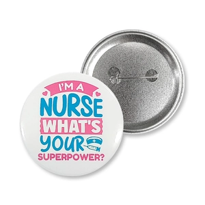 Macro shot showing front graphic design and pin back structure of tinplate nurse badge