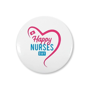 Macro view of Happy Nurses Day tinplate badge with a pink heart and medical cross symbol