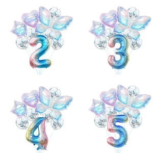 Rainbow gradient number balloons set with iridescent butterfly and stars for birthday party