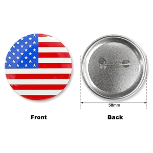 Detailed front and back view of a 58mm American flag tinplate badge with safety pin