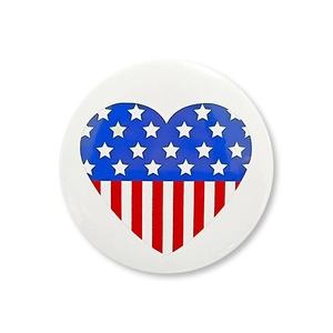 Detailed close-up of glossy tinplate badge featuring heart-shaped USA flag design