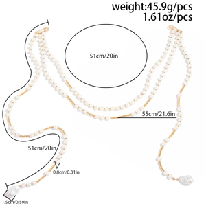 Detail of multi-layer faux pearl body chain with star pendant and safety pin clasp