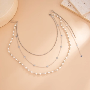 Silver layered brooch chain with faux pearls and star charms for clothing decoration